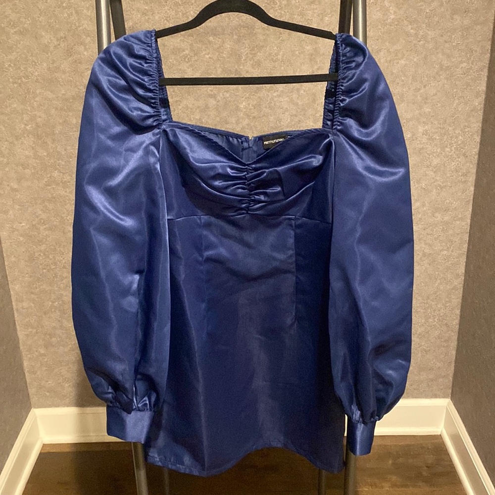 Navy blue long sleeve mini dress, satin material. Size 6.